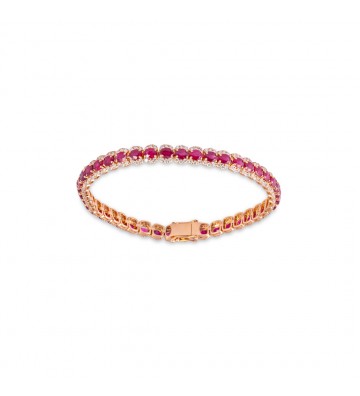 Bracciale in oro rosa con rubini taglio ovale e parentesi in brillanti