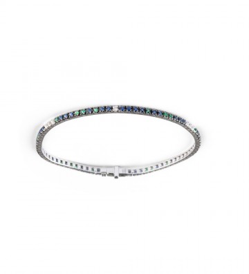 Bracciale tennis in oro bianco con motivi in zaffiri smeraldi e diamanti